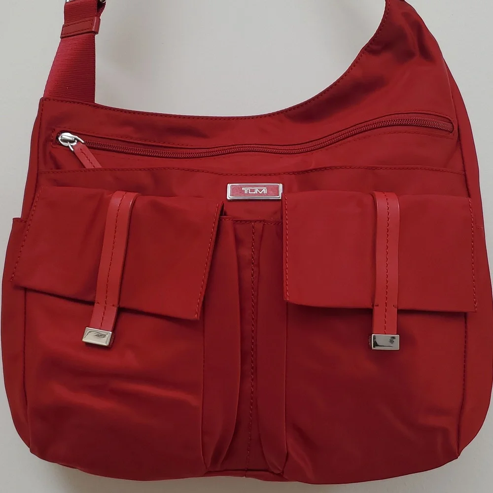 Tumi Pucket E/W Flap Crossbody Messenger Bag in Red with Silver Hardware